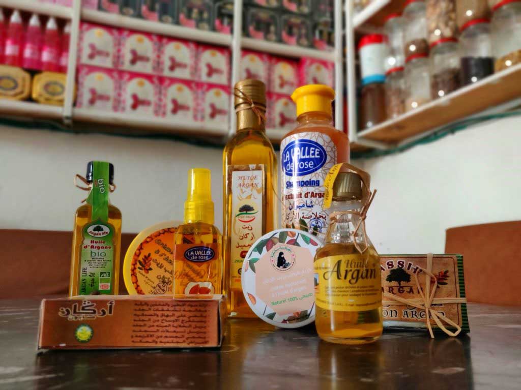 different Argan oil products like shampoo and soap in a shop